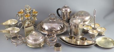 A group of assorted plated wares including a William IV plated egg cruet with gilt