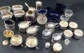 A group of assorted plated condiments, two silver condiments, a silver strainer two silver mounted