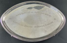 A 19th century Dutch white metal navette shaped teapot stand, with engraved presentation inscription