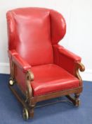 A Victorian mahogany convalescence armchair by John Ward, London, late 19th century, the reclining