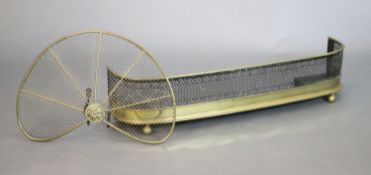 A Regency brass and wire mesh bow fronted kerb and a brass fan shaped spark guard, kerb W.119.5cm