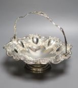 An Edwardian embossed silver fruit basket, Joseph Rodgers & Sons, Sheffield, 1903, 28cm, 19oz.