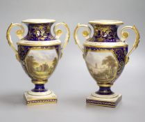 A Derby pair of two handled shield vases, painted with scenes of Old Castle Oxenford and Warwick