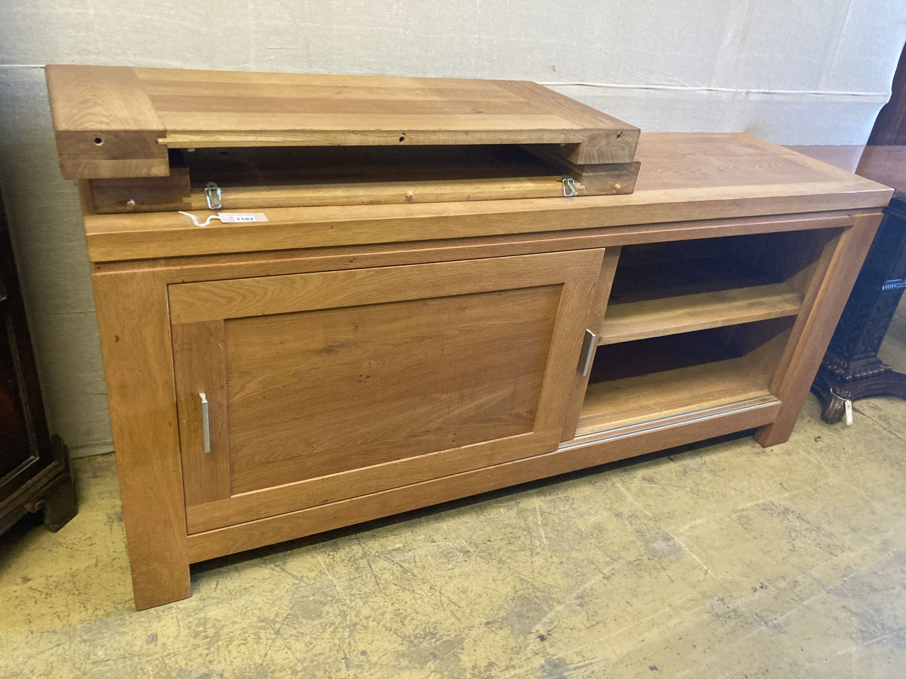 A contemporary oak dining suite, comprising a refectory style extending dining table on heavy 'H' - Image 3 of 5