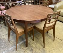 A mid century design Dryland Danish teak extending dining table, 120cm diameter, height 72cm and