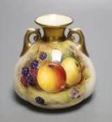A Royal Worcester two handled vase, painted with fruit and berries by W. Bee, signed, date mark