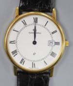 A gentleman's modern 18ct gold quartz dress wrist watch, retailed by Garrard, on a black leather