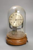 A Bulle type electric mantel clock, under a glass dome, height 26cm