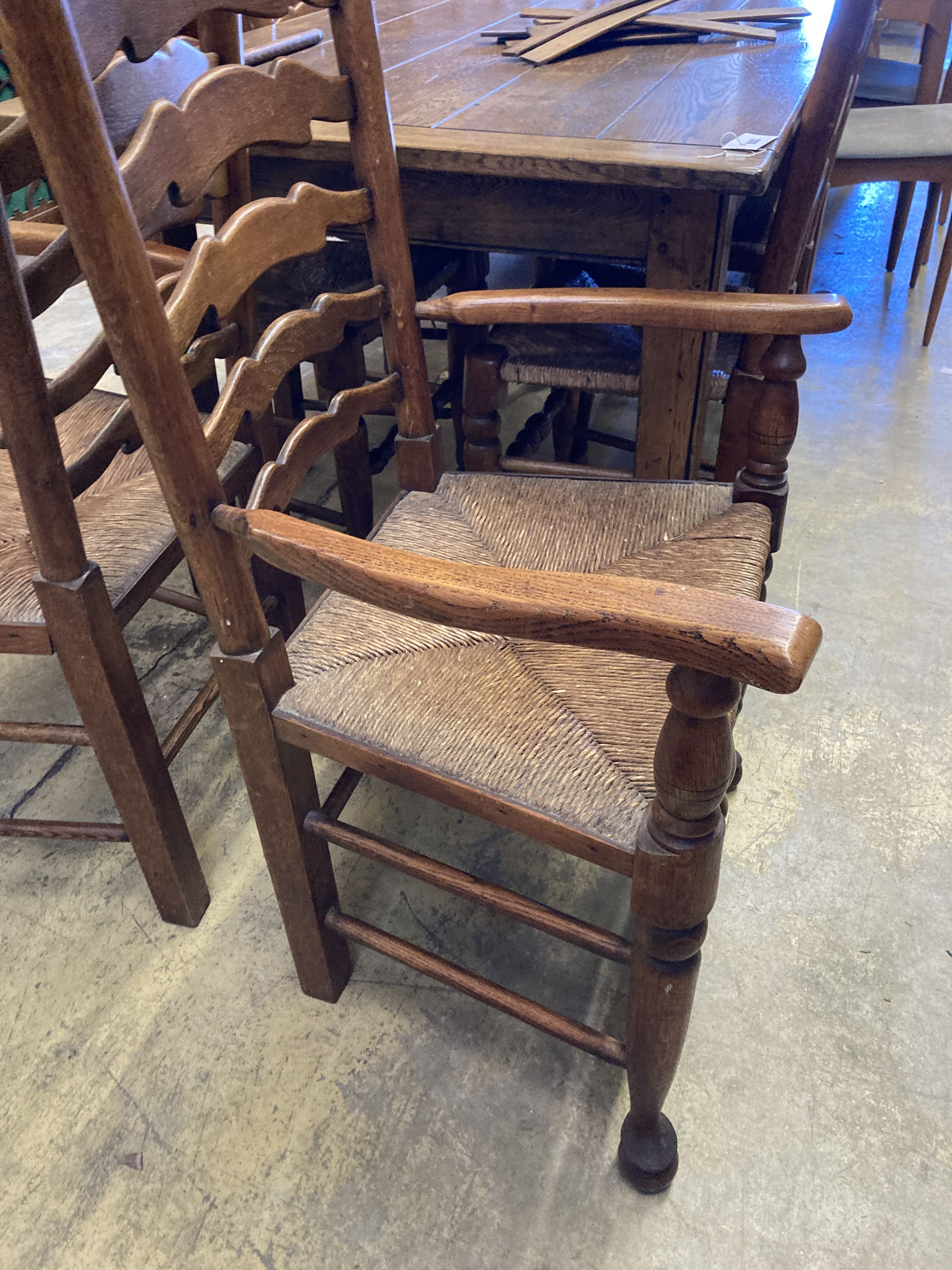 A set of six ladderback dining chairs with rush seats, two having arms - Image 4 of 7