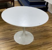 An Arkana tulip table, diameter 106cm height 72cmCONDITION: Screws to the top don't stay in. Some