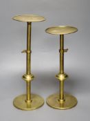 A pair of brass telescopic display stands