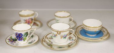 A Royal Worcester jewelled coffee cup and saucer painted with heathers by George Hundley, a Royal