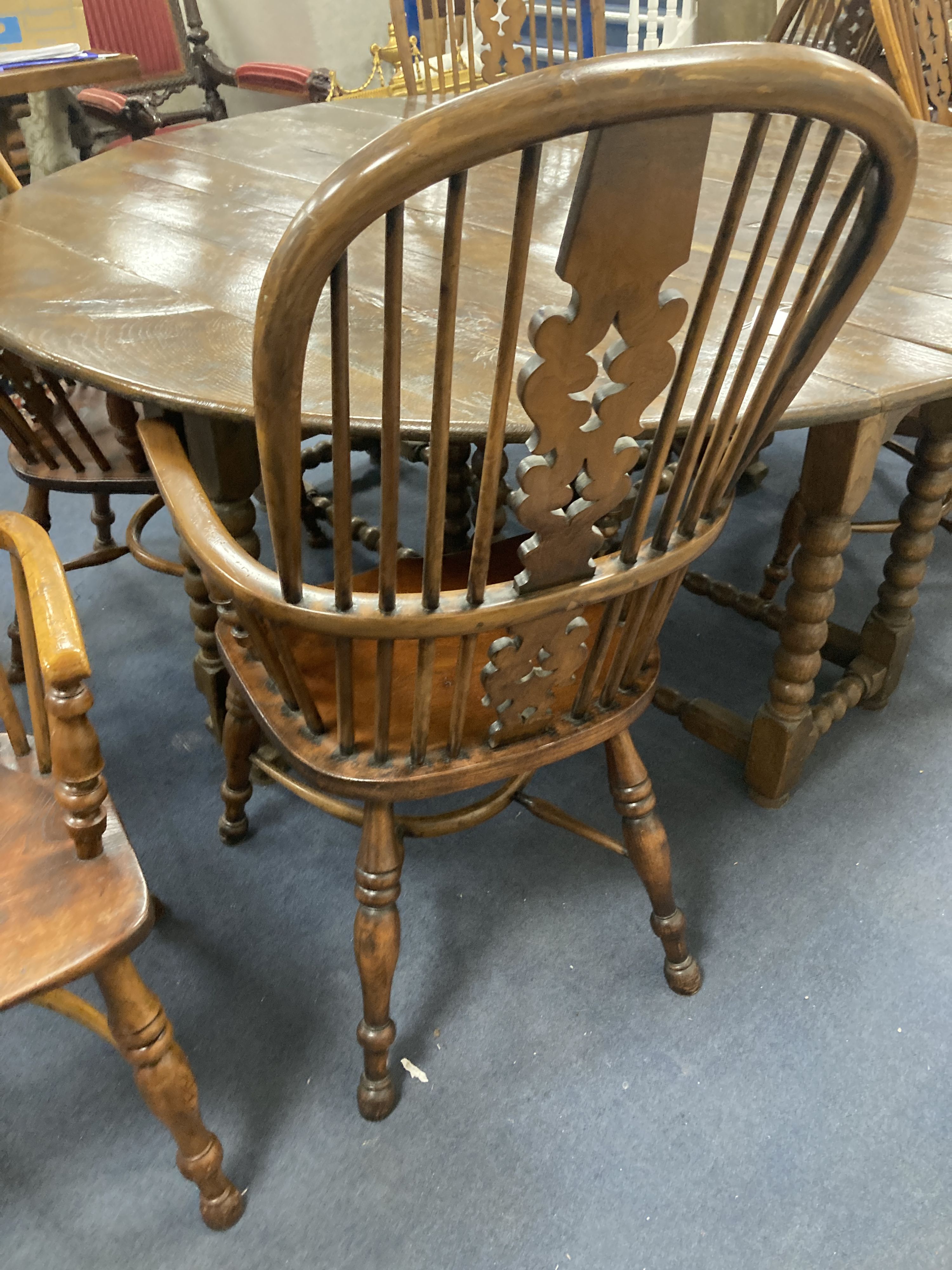 A set of eight 19th century and later Yorkshire area yew, elm and ash Windsor armchairs - Image 4 of 6