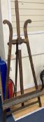 An early 20th century pine artist's studio easel, height 180cm