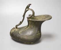 After the antique. A bronze ascos ewer, signed, height 20cm