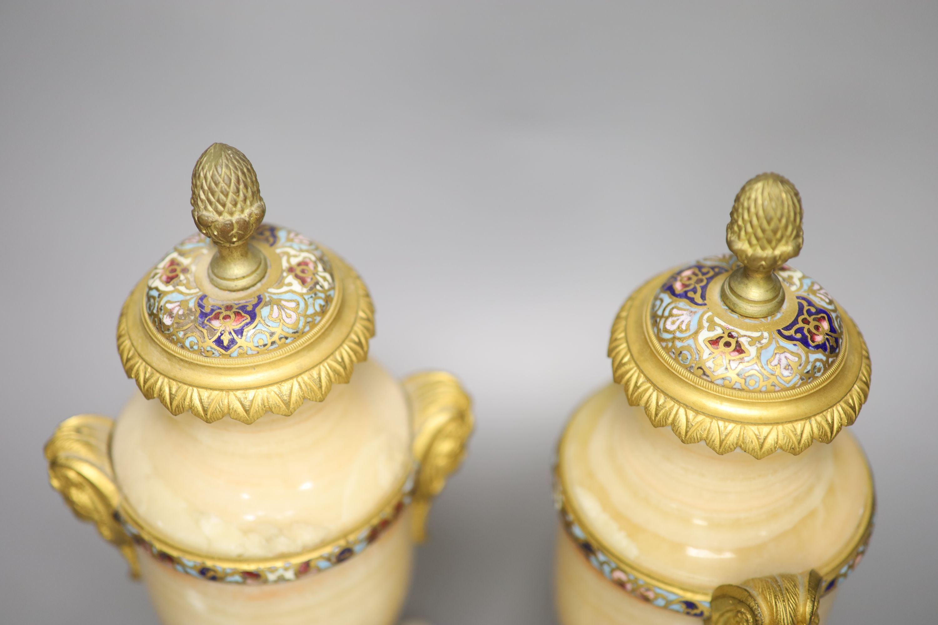 A pair of late 19th century alabaster and champleve enamel urns (formerly part of a clock - Image 3 of 3