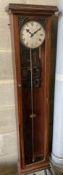 A Synchronome electric carved mahogany master wall clock, NRA 456, height 136cm