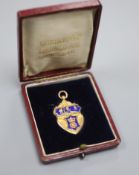 An Edwardian Derbyshire League 9ct gold and enamel cricket medal, Vaughton & Sons, Birmingham, 1909,