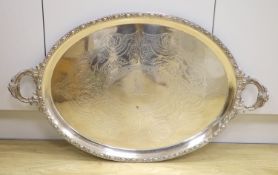 A Victorian silver plated oval two handled tea tray, 78cm.
