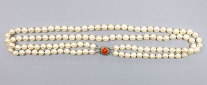 A double strand cultured pearl necklace, with coral bead set 800 white metal clasp, 43cm, gross 51