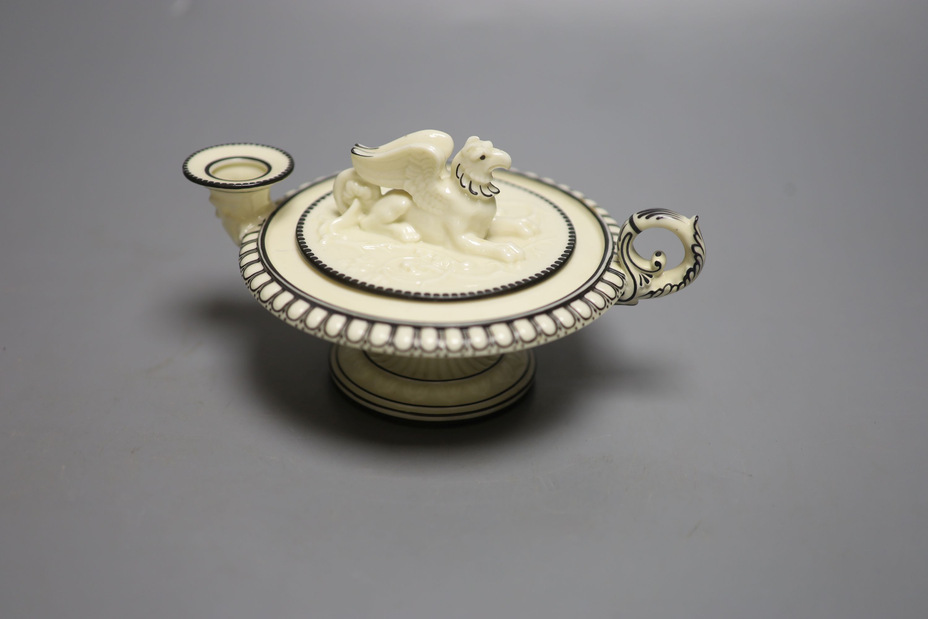 A rare Royal Worcester Kerr and Binns period inkwell, in the form of an oil lamp, with griffin