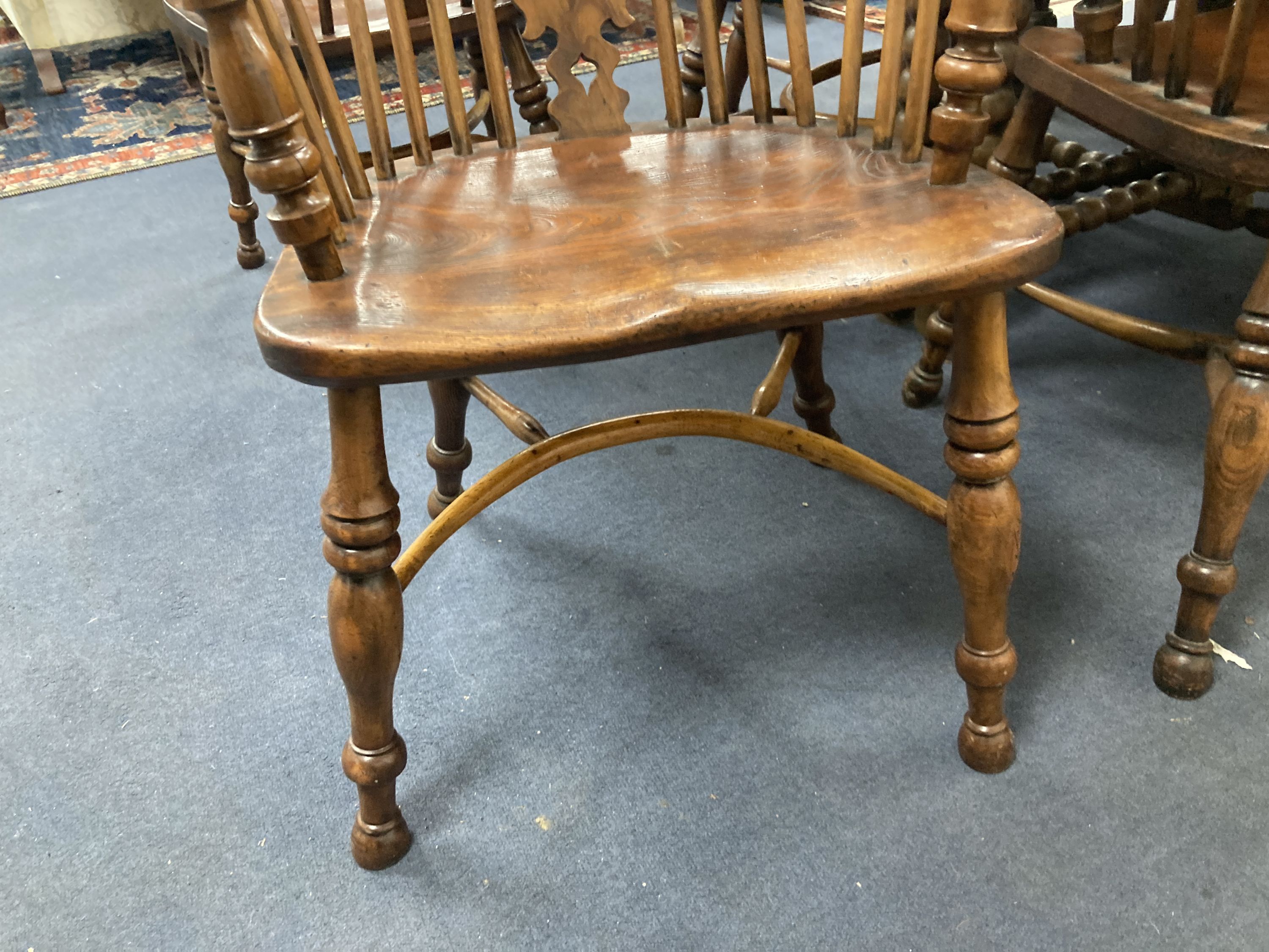 A set of eight 19th century and later Yorkshire area yew, elm and ash Windsor armchairs - Image 3 of 6