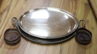 A pair of plated coasters, an oval salver and a trayCONDITION: Both oval trays have scratches and