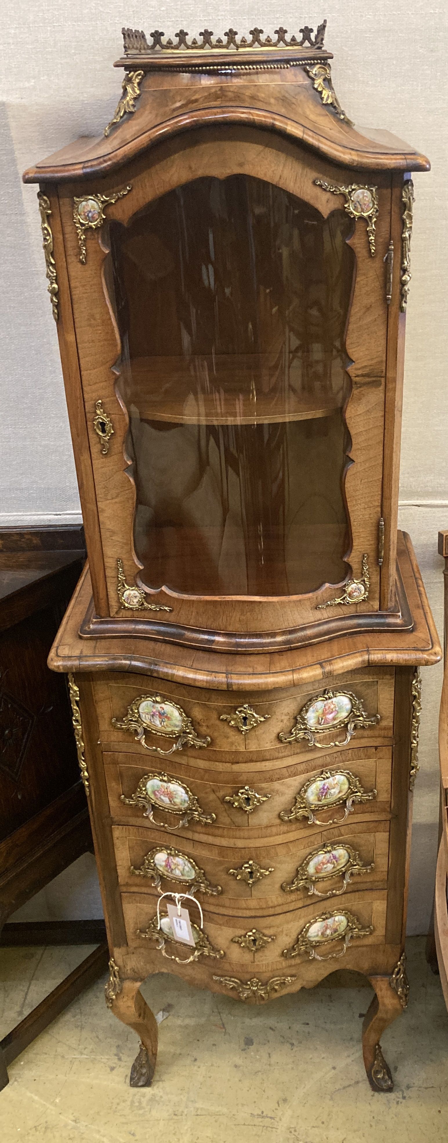 A small Louis XV style kingwood and walnut serpentine vitrine on commode base, width 49cm, depth