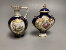 Two Royal Crown Derby vases, tallest 11cm highCONDITION: The single handled vase has discoloured
