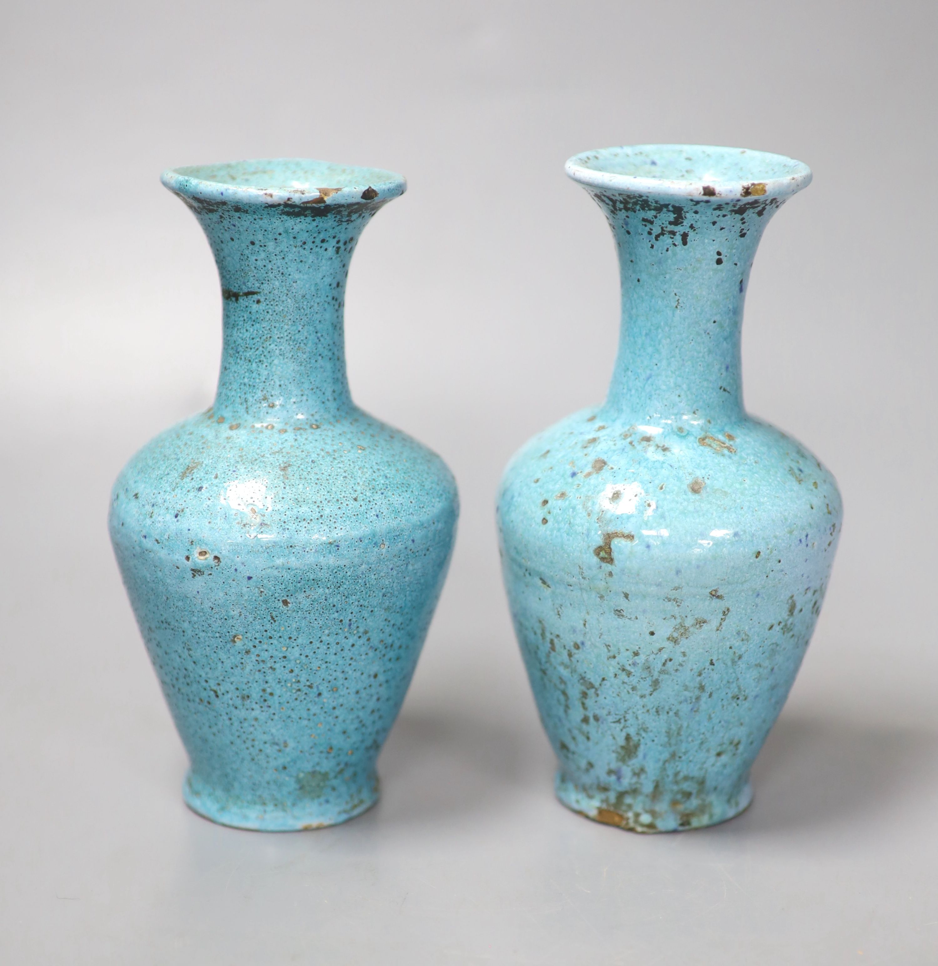 A pair of pale blue Eastern pottery vases, 16.5cm high