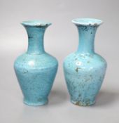 A pair of pale blue Eastern pottery vases, 16.5cm high