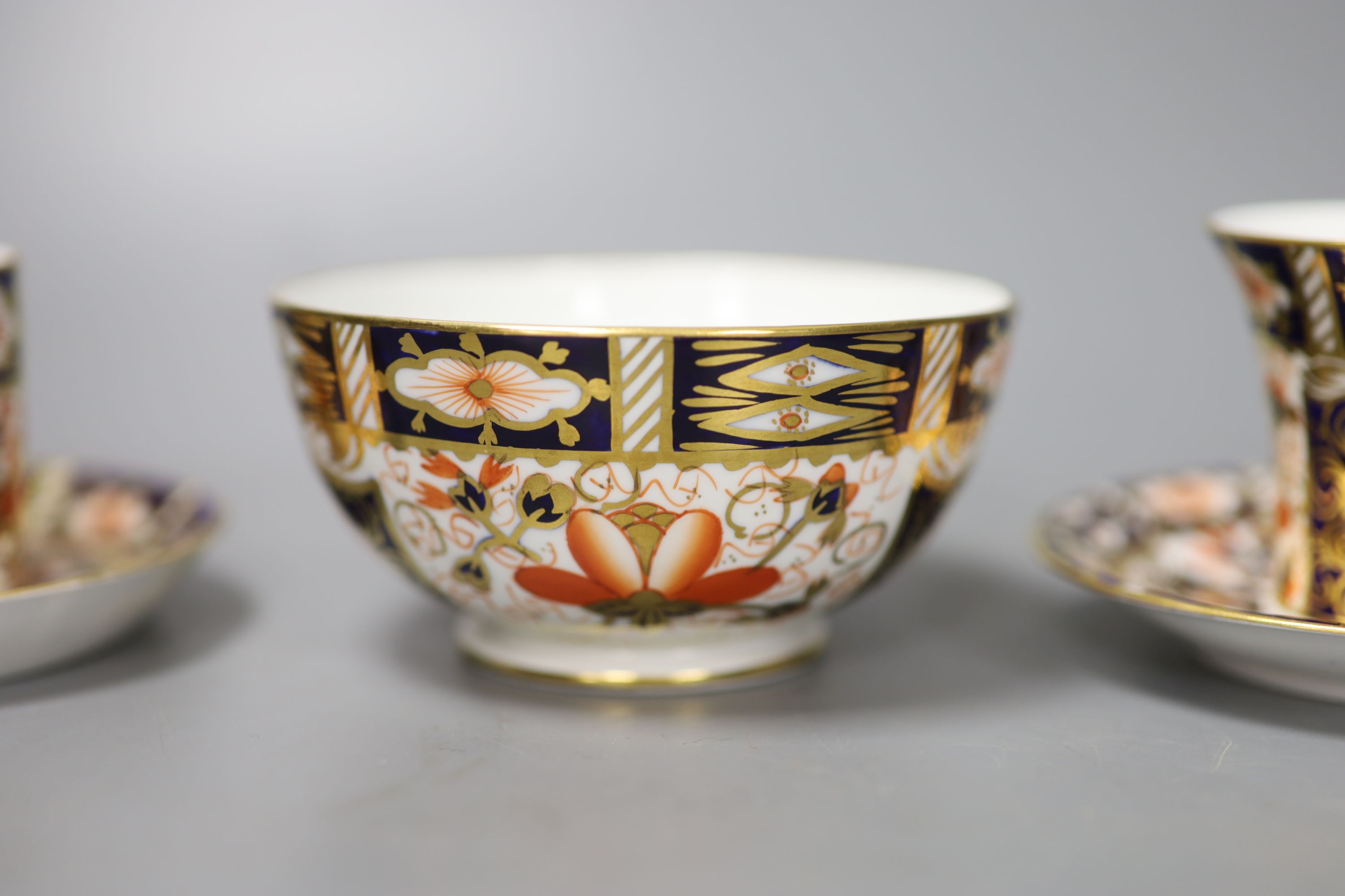 A pair of Royal Crown Derby coffee cups, imari pattern 2451, a coffee can and saucer and a sugar - Image 2 of 7