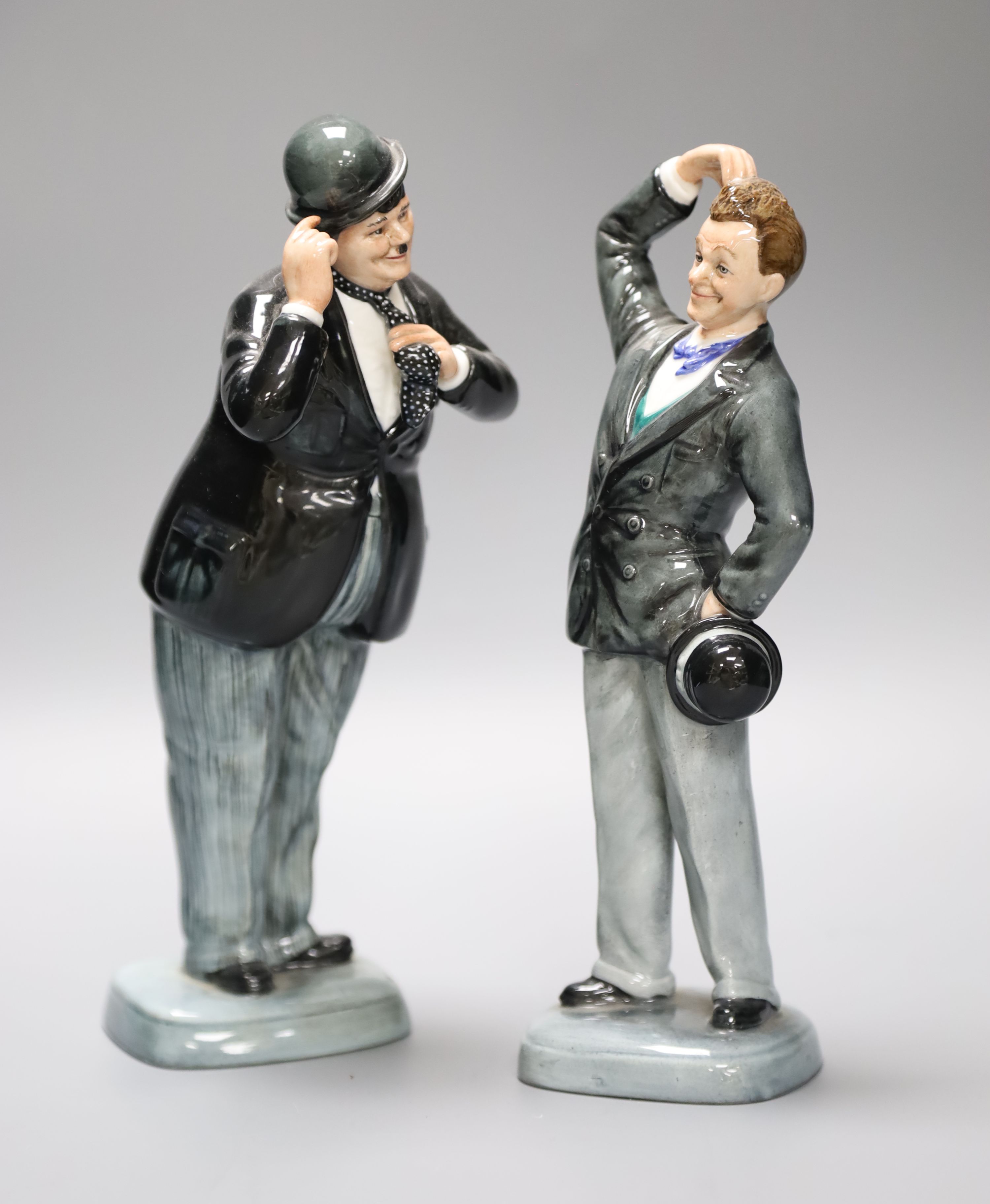 A Royal Doulton Oliver Hardy, HN2775, together with Stan Laurel, HN2774 (a.f.)CONDITION: Hardy-