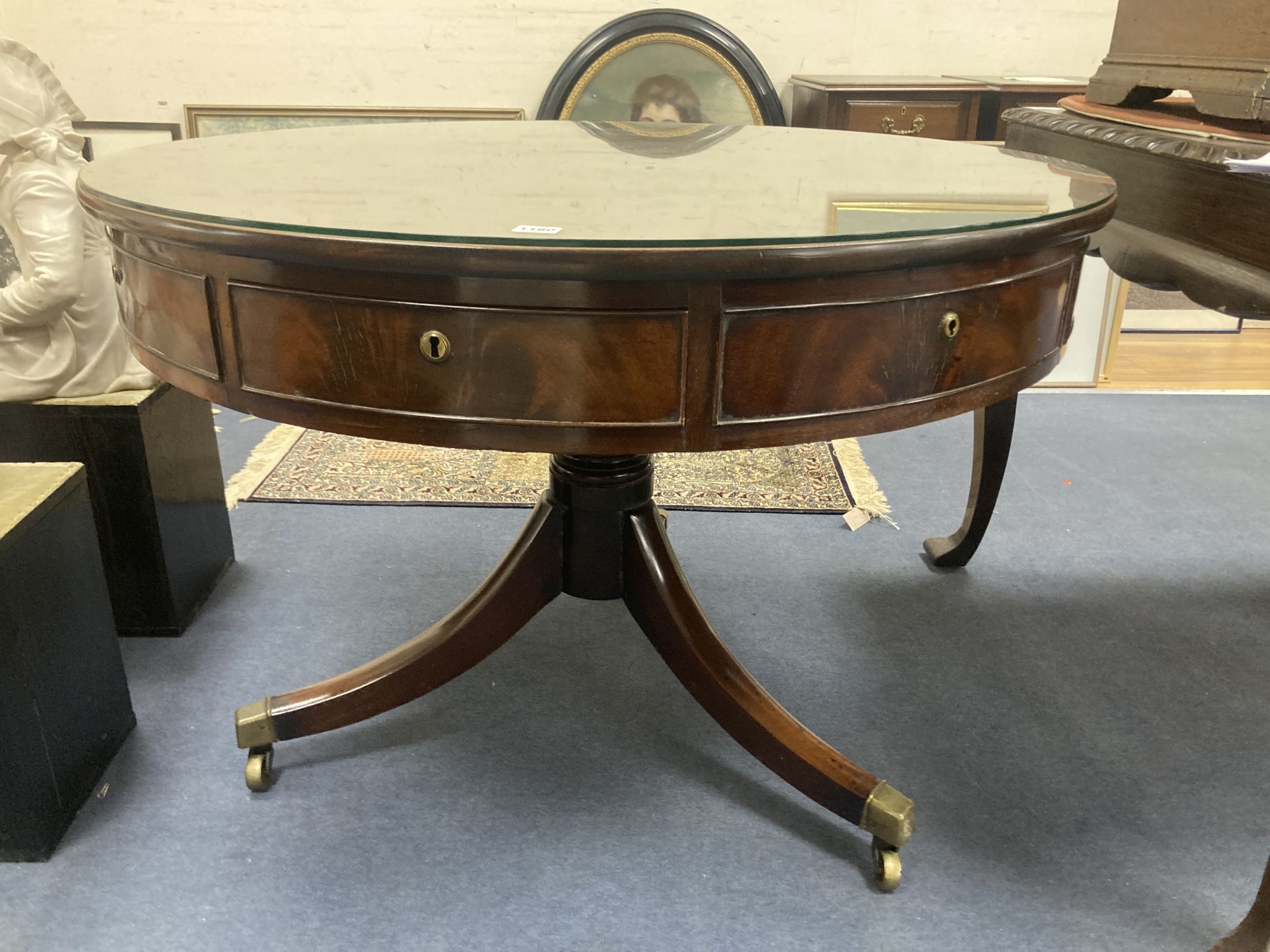 A Regency mahogany drum top library table, fitted four frieze drawers on ring turned stem and - Image 4 of 6