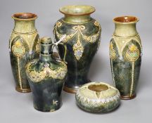 A pair of Royal Doulton vases, a similar larger vase and a small flagon