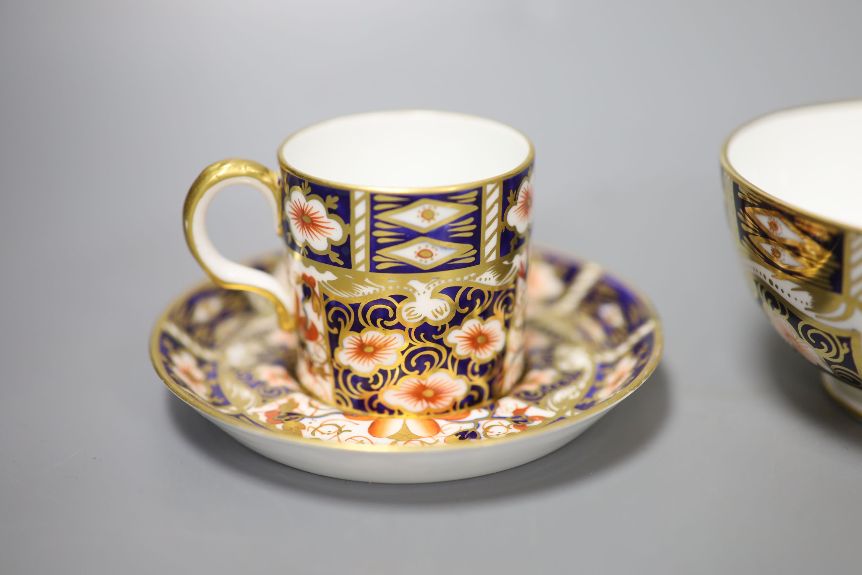 A pair of Royal Crown Derby coffee cups, imari pattern 2451, a coffee can and saucer and a sugar - Image 3 of 7