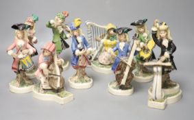 Nine Leslie Ray earthenware monkey bandsmen, height 19cmCONDITION: Seated cellist bow marginally