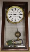 A Brillie mahogany, marble and brass electric wall clock, length 45cm