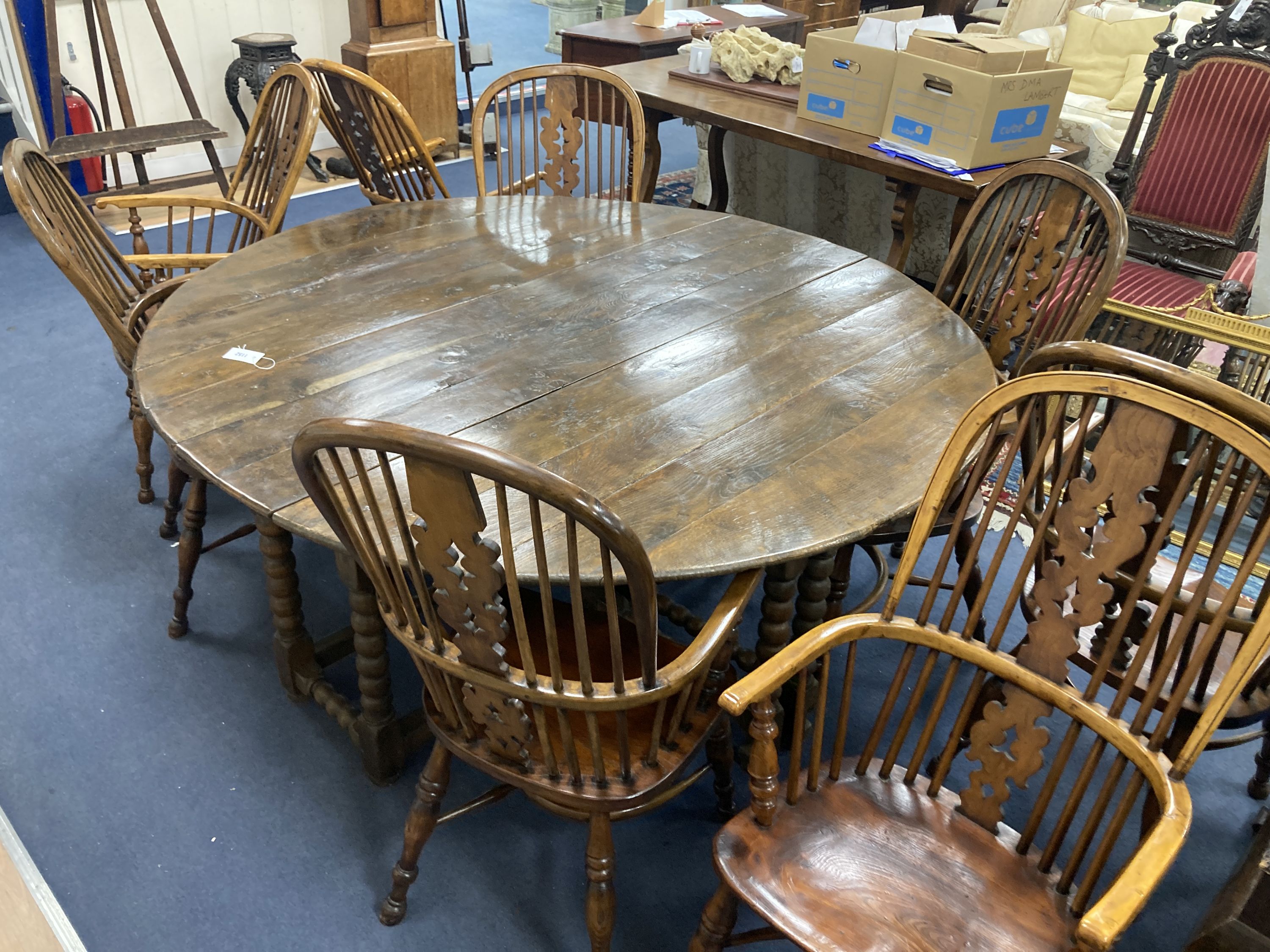 A set of eight 19th century and later Yorkshire area yew, elm and ash Windsor armchairs - Image 6 of 6