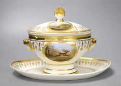 A Paris porcelain tureen and cover highly gilded and painted with four oval panels, two with dogs,