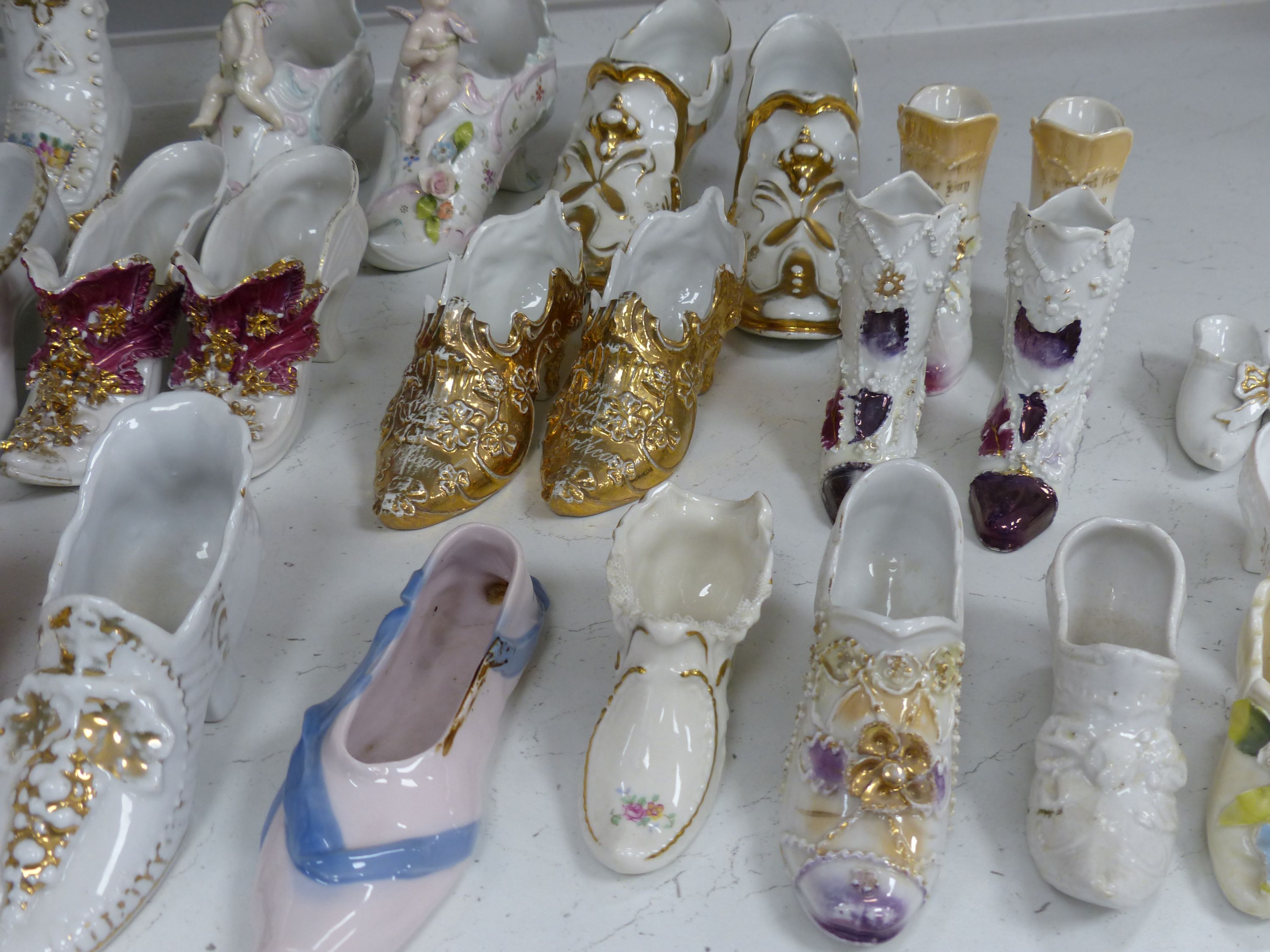 A collection of ceramic shoes - Image 3 of 12