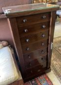 A Victorian mahogany Wellington chest, width 50cm, depth 35cm, height 104cm