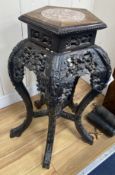 A Chinese marble top carved hardwood jardiniere stand, width 38cm, depth 38cm, height 66cm