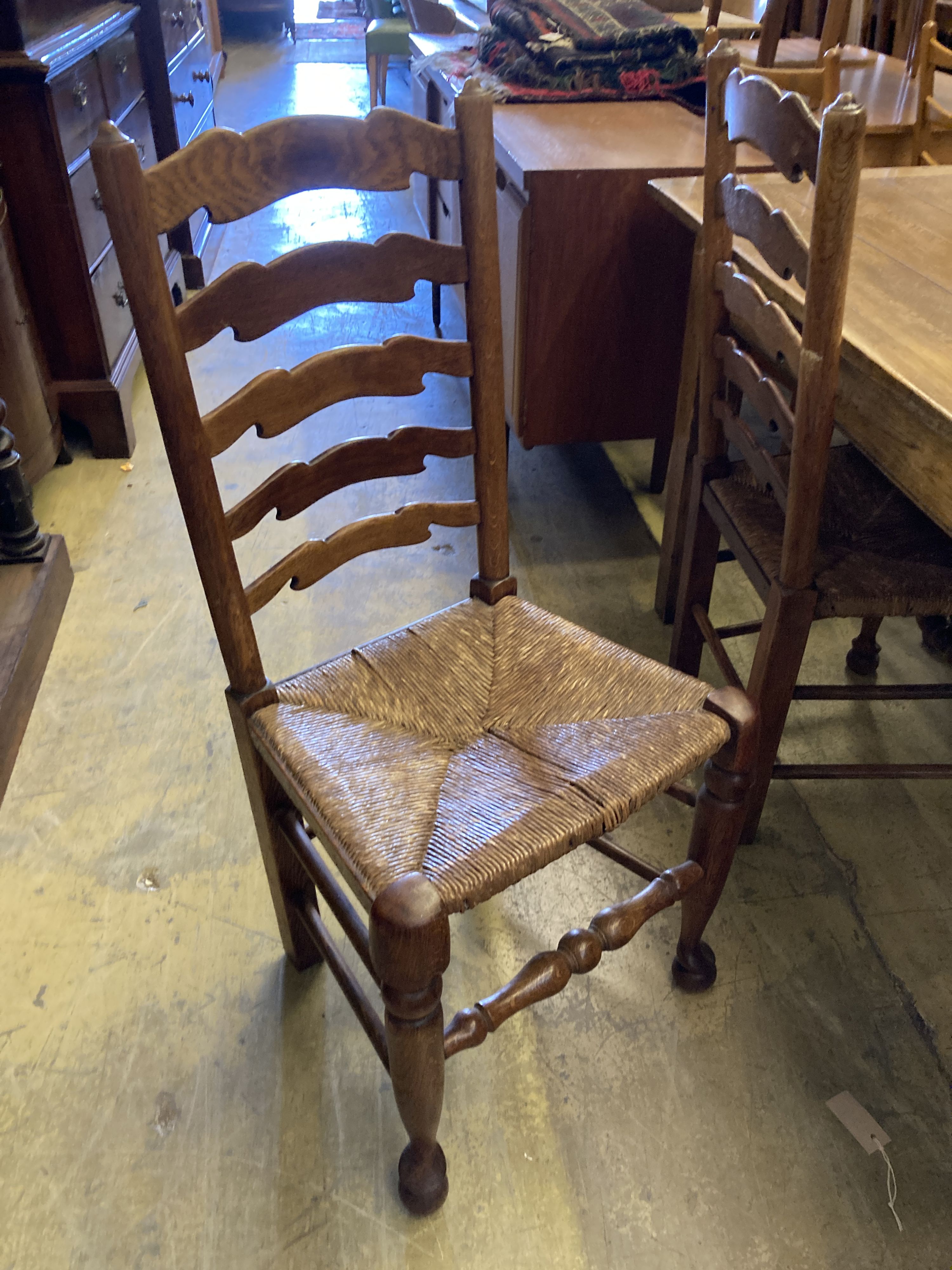 A set of six ladderback dining chairs with rush seats, two having arms - Image 5 of 7