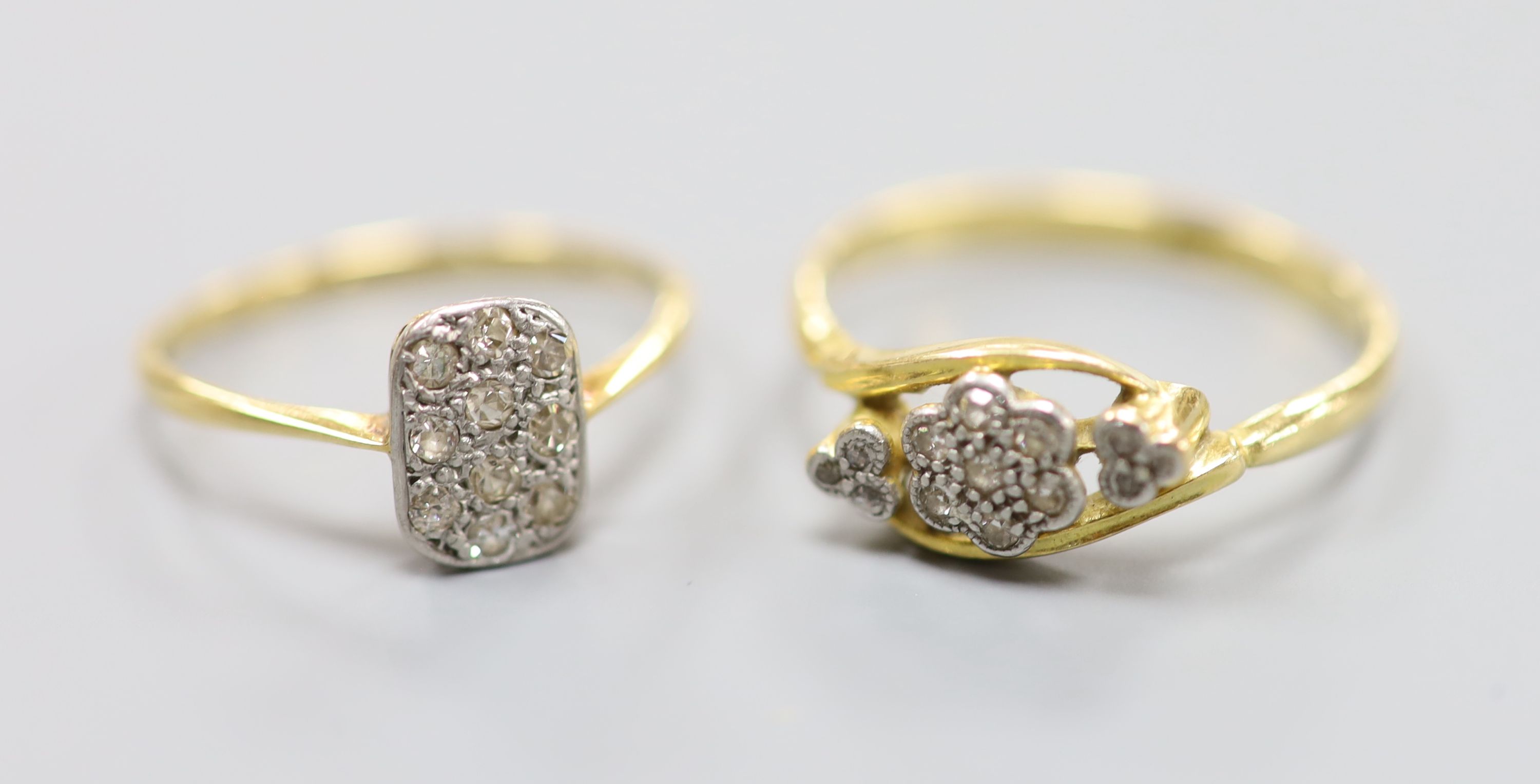 A 1940's 18ct and plat, diamond cluster set tablet ring, size P/Q, gross 1.9 grams and a similar
