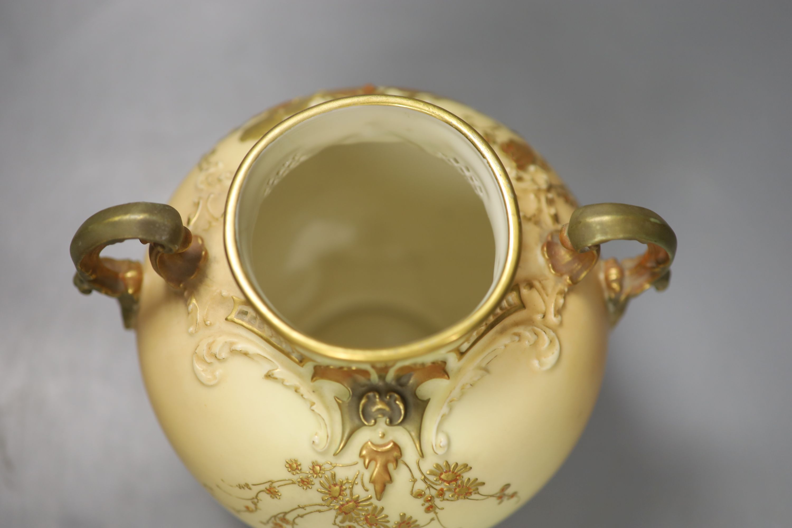 A Royal Worcester two handled ovoid vase moulded and gilded with flowers on a blush ivory ground, - Image 4 of 5