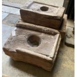 Three Indonesian hardwood rice mortars, largest 60cm, depth 38cm, height 23cm