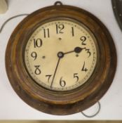 A stained wood electric slave dial, diameter 31cm