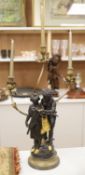 A spelter figural three branch candelabra, height 71cm