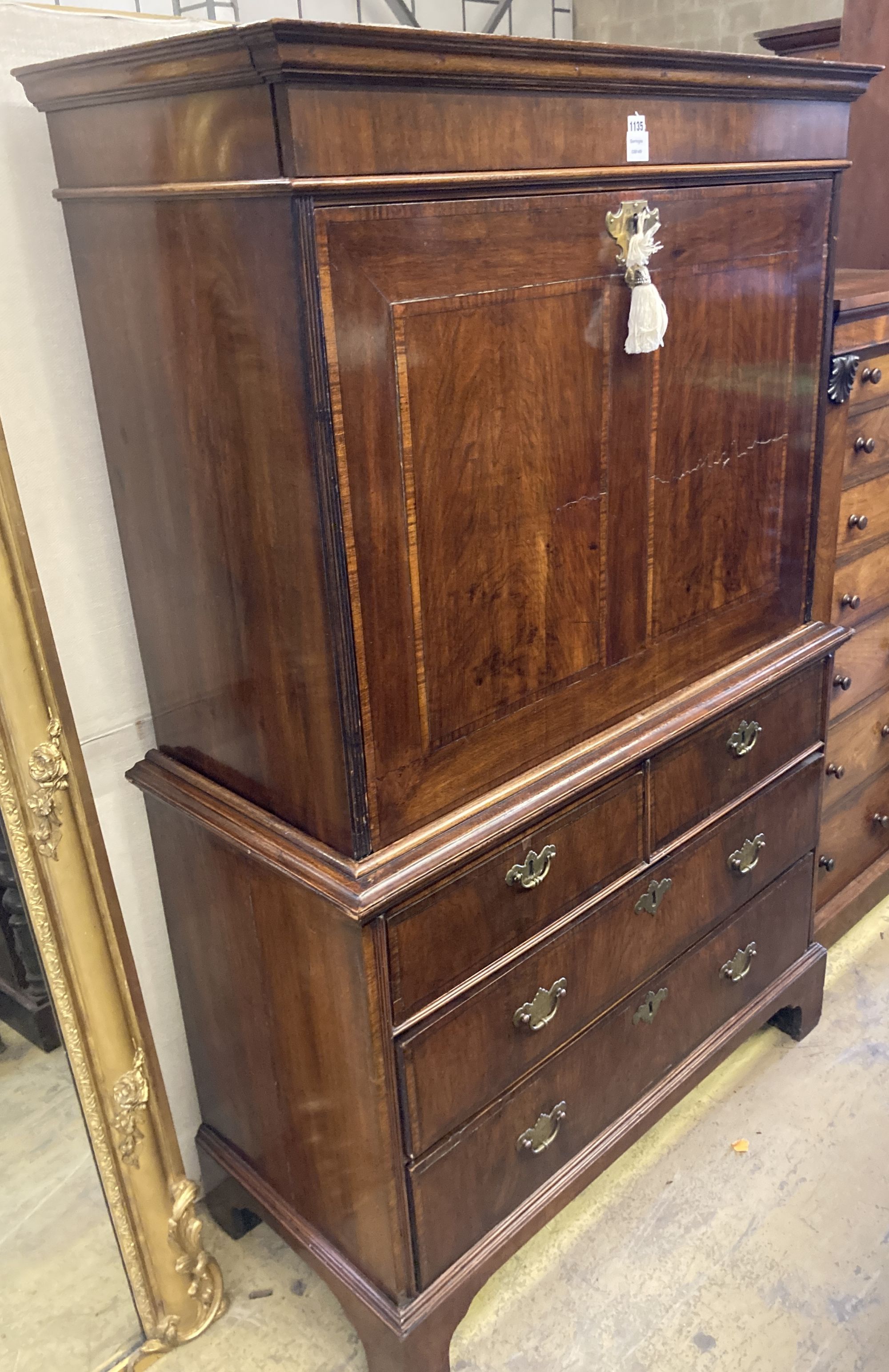 An 18th century walnut escritoire, width 108cm depth 49cm height 173cm